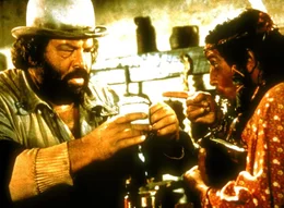 Als vermeintlicher Wunderdoktor lehrt Buddy (Bud Spencer, l.) den Bewohnern eines Wildwest-St&auml;dtchens das F&uuml;rchten.