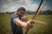 Hazen Audel aims traditional Makushi bow and arrow.