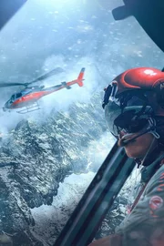 Captain Surrendra Paudel sits in the helicopter.