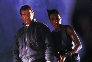 James Bond (Roger Moore), May Day (Grace Jones)