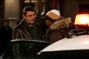 Chris Noth as Detective Mike Logan