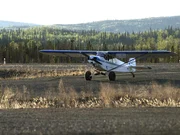 The plane is about to take off as Seth Fairbanks and Charlie Wright go to investigate the Yukon River break-up.