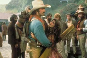 Matthew Quigley (Tom Selleck), Crazy Cora (Laura San Giacomo)