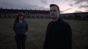 Paranormal Investigators Amy Bruni and Adam Berry, at Fort Adams, Newport RI, Discuss Case with fort in background