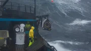 The Summer Bay deckhands hauling gear in rough seas.