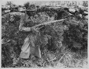 Camouflage Brought To Fine Art. The task of patrolling Dartmoor is undertaken by the Home guard Yeomanry Company composed in the main of moor bred men. They know their own locality well and master the art of camouflaging themselves to blend into the boulders and [...] perfectly. This member of the Home Guard Yeomanry Company is camouflaged so well against the Dartmoor background that he is unrecognisable at 30 yards.