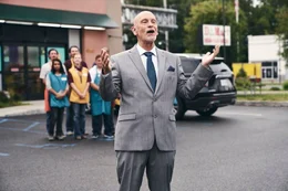 John Malkovich als Congressman Sam Nelson