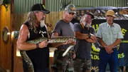 Dusty, Gary, Jay, Tom showing kids pythons