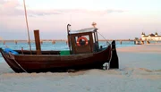 Fr&uuml;her war die Fischerei eine der Haupteinnahmequellen auf Usedom. Nur wenige Fischerboote legen noch vom Strand ab.