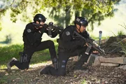 L-R: Officer Victor Tan (David Lim), Sergeant Daniel 'Hondo' Harrelson (Shemar Moore)