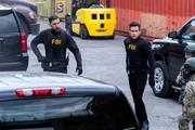 &bdquo;Torn" - After finding a group of teens dead from a drug overdose, the team races to find the dangerous dealer and his supplier. Meanwhile, OA questions where he stands in his faith. Pictured (L-R): Zeeko Zaki as Special Agent Omar Adom 'OA' Zidan and John Boyd as Special Agent Stuart Scola.