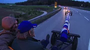 Heimkehr der Unterbrunner mit dem geraubten Maibaum.