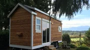 Located near Qualicum Beach, on Vancouver Island, BC, this tiny home sits on an 8' x 10' trailer and the exterior features custom milled Vancouver Island Cedar, as seen on Tiny House Hunters.
