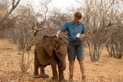 NAMIBIA- Dr Simone Herzog taking care of Kohadi Hamiros, a young Desert Elephant who lost its family.