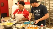L-R: Jessica Bacchus and Matt DeFranco make tie-dye batter for color run cake.