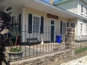 Behind the scenes of the production crew filming Conyers, Georgia welcome sign and old train station.