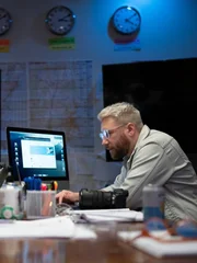 Wide shot war room table - Matt, Kelly, Avalon