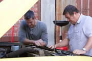 Ant Anstead (l.) and Mike Brewer looking over Scout engine.