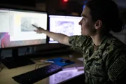Lt. Caitlin Fine is a Meteorologist at the Joint Typhoon Warning Centre in Hawaii with responsibilities including USN Operations Officer & Typhoon Duty Officer. Her role involves forecasting to protect US Navy assets and interpret how weather impacts US Navy exercises.