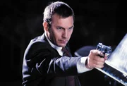 Frank Farmer (Kevin Costner)