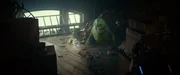 Slimer in a trash pile in Columbia Pictures&rsquo; GHOSTBUSTERS: FROZEN EMPIRE.
