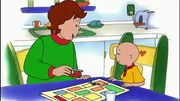 Aber Papi (l.) hilft Caillou (r.), das herausgerissene St&uuml;ck wieder anzukleben.