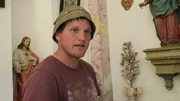 Der Bauer Reihard Leitner erz&auml;hlt die Geschichte seiner Kapelle in Egg.