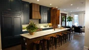 Alison Victoria, host of Windy City Rehab, incorporated custom blue caninets, elevated copper finishes and a coordinating penny round backspalsh into the kitchen of this historic Chicago home. Alison Victoria, host of Windy City Rehab, incorporated custom blue caninets, elevated copper finishes and a coordinating penny round backspalsh into the kitchen of this historic Chicago home.