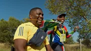 Sandile Mkhize (WFL-Botschafter, vorne).