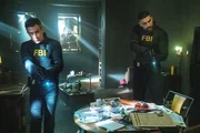 Pictured (L-R): John Boyd as Special Agent Stuart Scola and Zeeko Zaki as Special Agent Omar 'OA' Zidan.
