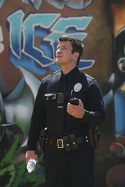 John Nolan (Nathan Fillion).