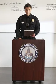 John Nolan (Nathan Fillion)