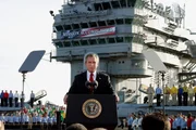 President Bush declares the end of major combat in Iraq as he speaks aboard the aircraft carrier USS Abraham Lincoln off the California coast, in this May 1, 2003 file photo. President Bush declares the end of major combat in Iraq as he speaks aboard the aircraft carrier USS Abraham Lincoln off the California coast, in this May 1, 2003 file photo.