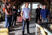"The Patton Project" -- Pictured: Daniela Ruah (Special Agent Kensi Blye), Max Martini (NCIS Agent Arlo Turk), Esai Morales (NCIS Deputy Director Louis Ochoa), Eric Christian Olsen (LAPD Liaison Marty Deeks), T.J. Ramini (Tobin Shaked) and Chris O\'Donnell (Special Agent G. Callen). Deputy Director Ochoa (Esai Morales) volunteers the NCIS team to assist with a covert operation tied to a terrorist group advocating for extreme military force. Also, Callen has concerns as to what an assignment of this nature could mean for the future of the team, on NCIS: LOS ANGELES, Sunday, Nov. 18 (9:00-10:00 PM, ET/PT) on the CBS Television Netwo Photo: Monty Brinton/CBS &Atilde;&Acirc;&copy;2018 CBS Broadcasting, Inc. All Rights Reserved.