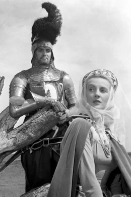 Modred (Stanley Baker, li.) hat in Morgan Le Fay (Anne Crawford, re.) eine Verb&uuml;ndete.