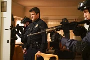 John Nolan (Nathan Fillion). John Nolan (Nathan Fillion).