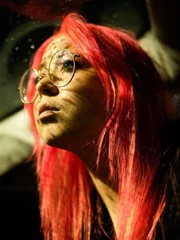 Shelby looking out car during stake out