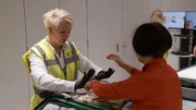 A traveller's suitcase is searched for suspicious items at the UK Terminal. (National Geographic)