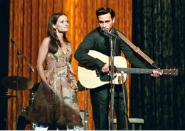 Johnny Cash (Joaquin Phoenix), June Carter (Reese Witherspoon)