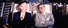 Pola (Marilyn Monroe, l.) &uuml;berlegt, ob ihr Vermieter Freddie Denmark (David Wayne, r.) nicht doch als Ehemann in Betracht kommen k&ouml;nnte ..._Titel: Wie angelt man sich einen Million&auml;r?