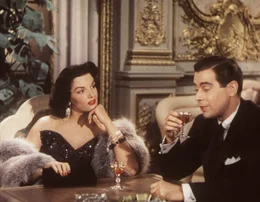 Dorothy (Jane Russell, l.) begegnet dem Privatdetektiv Erni Malone (Elliott Reid, r.) zwar mit einer gewissen Skepsis, findet ihn aber doch recht anziehend ...