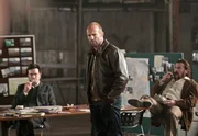 F&uuml;r seine Mission braucht Danny (Jason Statham, l.) die Unterst&uuml;tzung seiner ehemaligen Team-Kollegen Meier (Aden Young, M.) und Davis (Dominic Purcell, r.).