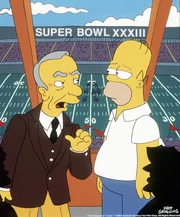 Rupert Murdoch (l.) erkl&auml;rt Homer (r.), dass er der Boss der Football-Mannschaft ist ...