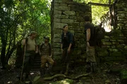 The team (Cork Graham, Emilio White, Mehgan Heaney-Grier, Brett Tutor) examine possible Nazi house ruins.