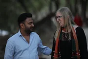 Jenny and Sumit walking.