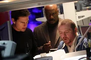 Lagebesprechung: Ex-Agent Ethan Hunt (Tom Cruise, l.) mit seinem Team (Ving Rhames, M., Simon Pegg, r.).