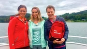 &bdquo;Wundersch&ouml;n&ldquo;-Ruhrradler Anne Willmes und Stefan Pinnow treffen Ruhrtalradweg-Expertin Sandra Wolfson (Mitte) am Hennesee.