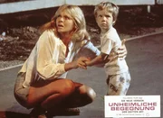 Auch die Malerin Jillian Guiler (Melinda Dillon, l.) und ihr Sohn Barry (Cary Guffey, r.) f&uuml;hlen sich auf unerkl&auml;rliche Weise zu dem Tafelberg in Wyoming hingezogen ...