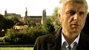 Udo Wachtveitl mit Bamberg im Hintergrund.