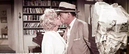 Richard (Tom Ewell, r.) ist allein zu Hause, um zu arbeiten, bis die h&uuml;bsche neue Nachbarin (Marilyn Monroe, l.) seine Fantasie befl&uuml;gelt ...